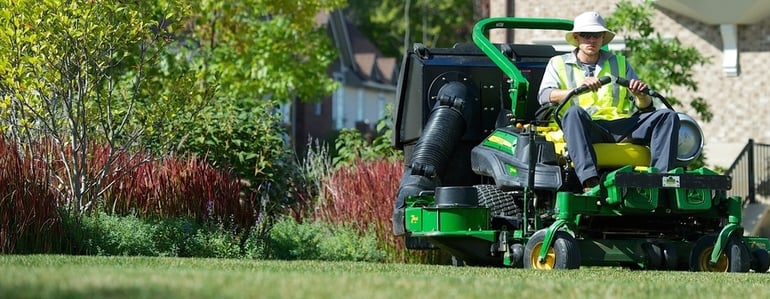 Schill Grounds Management commercial landscaper mowing grass