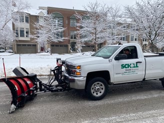 Schill Grounds Management snow plow truck 