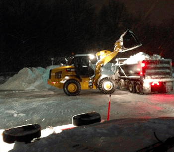 Schill commercial snow removal during a winter storm