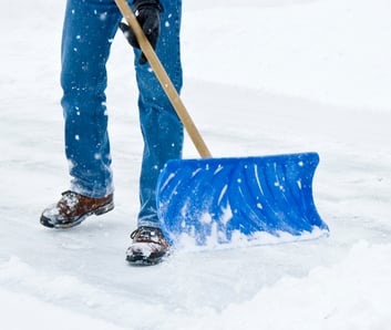 Person shoveling snow